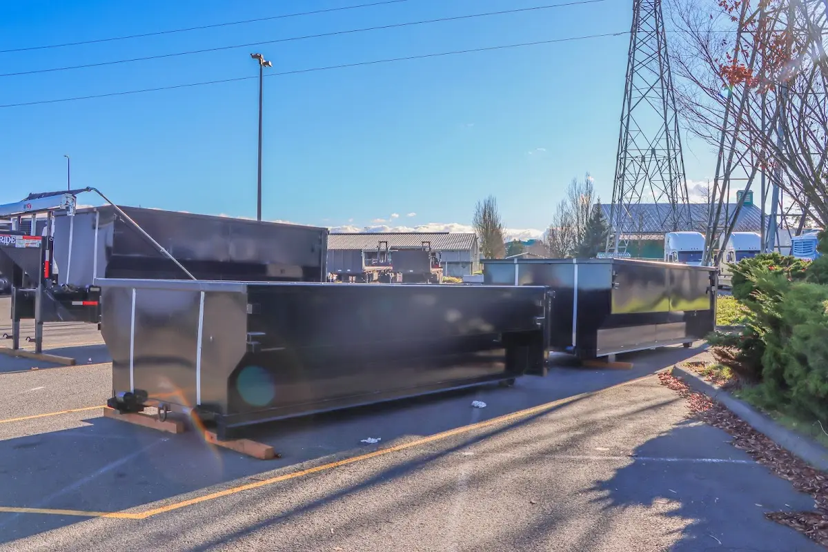 Roll-off dumpster ready for waste disposal at job site for Concrete Dumpster Rental in Saraland